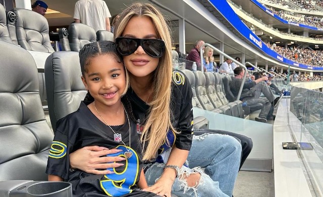 TRUE THOMPSON ATTENDS FIRST FOOTBALL GAME WITH MOM KHLOE