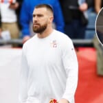 Travis Kelce Gazes at Taylor Swift Poster Ahead of Chiefs Game