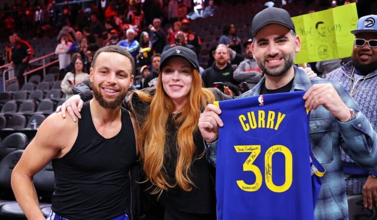 Steph Curry, Lindsay Lohan Have a Sweet Interaction at Warriors Game