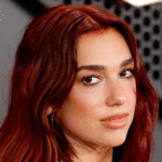 Dua Lipa Shuts Down the Grammys Carpet in This Plunging Gown