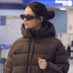 Lily James Wore the New Prada Buckle Bag Through TSA