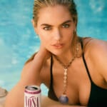 First Look: Kate Upton Poses Poolside For Vosa Spirits Canned Cocktails